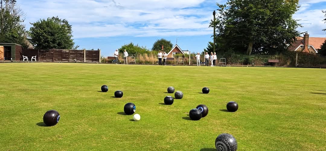 Playing bowls on the green